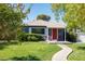 Charming Ranch home with red door and landscaped yard at 1206 Douglas Dr, Las Vegas, NV 89102