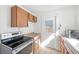 Kitchen boasts wood cabinets and stainless steel appliances at 1206 Douglas Dr, Las Vegas, NV 89102