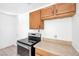 Kitchen with wood cabinets and stainless steel range at 1206 Douglas Dr, Las Vegas, NV 89102