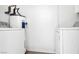 Bright laundry room with washer, dryer, and water heater at 1206 Douglas Dr, Las Vegas, NV 89102