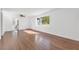 Living room with hardwood floors and view into kitchen at 1206 Douglas Dr, Las Vegas, NV 89102