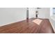Hardwood floors and sunny living room with kitchen access at 1206 Douglas Dr, Las Vegas, NV 89102