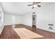 Hardwood floors and a bright living room with access to other rooms at 1206 Douglas Dr, Las Vegas, NV 89102