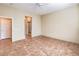 Large bedroom with ceiling fan and tile flooring at 17 Haig Point Ct, Henderson, NV 89052