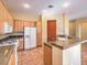 Bright kitchen featuring stainless steel appliances and an island at 17 Haig Point Ct, Henderson, NV 89052