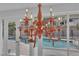 A coral colored chandelier hangs in the sunroom at 1812 S 16Th St, Las Vegas, NV 89104