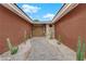 Mid-century modern entry with double doors and cactus landscaping at 1812 S 16Th St, Las Vegas, NV 89104