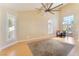 Open living area with hardwood floors and large windows at 2112 Brighton Shore St, Las Vegas, NV 89128