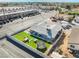 Aerial view of home with a new roof, trampoline, patio dining set, and privacy fence at 2690 Diamante Cir, Las Vegas, NV 89121