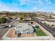 Aerial view of backyard featuring trampoline, lawn, patio dining and city view at 2690 Diamante Cir, Las Vegas, NV 89121