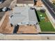 Aerial view of home with a new roof, trampoline, patio dining set, and privacy fence at 2690 Diamante Cir, Las Vegas, NV 89121
