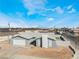 Aerial view of single story home with large front yard and desert landscaping at 2690 Diamante Cir, Las Vegas, NV 89121
