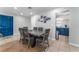 Well-lit dining area featuring modern furniture and seamless access to the kitchen at 2690 Diamante Cir, Las Vegas, NV 89121
