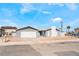 Charming single story home with a two-car garage and desert landscaping at 2690 Diamante Cir, Las Vegas, NV 89121