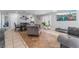 The living room offers tile floors, contemporary decor, and seamless transition to the dining area at 2690 Diamante Cir, Las Vegas, NV 89121
