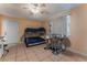 Comfortable living space with bunk beds, a dining table, and a ceiling fan for added comfort at 2690 Diamante Cir, Las Vegas, NV 89121