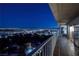 Spacious balcony with city views at night at 3111 Bel Air Dr # 20H, Las Vegas, NV 89109