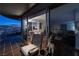 Private balcony with city views and outdoor seating at 3111 Bel Air Dr # 20H, Las Vegas, NV 89109