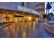 Regency Towers entrance with illuminated signage and landscaping at 3111 Bel Air Dr # 20H, Las Vegas, NV 89109