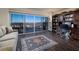 Bright home office features city views, built-in desk, and comfortable seating at 3111 Bel Air Dr # 20H, Las Vegas, NV 89109