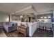 Modern kitchen with stainless steel appliances and breakfast bar at 3111 Bel Air Dr # 20H, Las Vegas, NV 89109