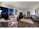 Spacious living room with hardwood floors and city views at 3111 Bel Air Dr # 20H, Las Vegas, NV 89109