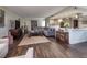 Living room features hardwood floors and open concept kitchen at 3111 Bel Air Dr # 20H, Las Vegas, NV 89109