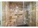 Spacious shower with tiled walls and built-in seat at 3111 Bel Air Dr # 20H, Las Vegas, NV 89109