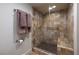 Large walk-in shower with tiled walls and seat at 3111 Bel Air Dr # 20H, Las Vegas, NV 89109