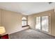 Bedroom with arched window and French doors at 3145 E Flamingo Rd # 2122, Las Vegas, NV 89121