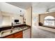Kitchen with granite counters, open to living area at 3145 E Flamingo Rd # 2122, Las Vegas, NV 89121