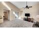Open concept living room with fireplace and French doors at 3145 E Flamingo Rd # 2122, Las Vegas, NV 89121