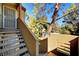 Exterior stairs leading to condo entrance with trees at 3145 E Flamingo Rd # 2122, Las Vegas, NV 89121