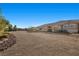 Spacious backyard with gravel and desert landscaping at 421 Foxhall Rd, Henderson, NV 89002