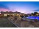 Entertaining backyard with pool, spa, and fire pit at 421 Foxhall Rd, Henderson, NV 89002