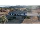 Single story home with large yard and mountain backdrop at 4255 W State Highway 168, Moapa, NV 89025