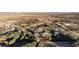 Aerial view shows expansive property with a house and pond at 4255 W State Highway 168, Moapa, NV 89025