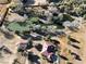 Aerial view of property highlighting the house and pond at 4255 W State Highway 168, Moapa, NV 89025