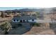 Aerial view of a house and other buildings on the property at 4255 W State Highway 168, Moapa, NV 89025