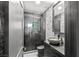 Modern bathroom with stone sink and walk-in shower at 4255 W State Highway 168, Moapa, NV 89025