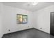 Bright bedroom with large window and modern chandelier at 4255 W State Highway 168, Moapa, NV 89025