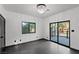Bedroom with patio access and modern chandelier at 4255 W State Highway 168, Moapa, NV 89025