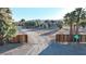 Long driveway leading to a house with gates on either side at 4255 W State Highway 168, Moapa, NV 89025