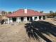 Back exterior of the house with a large patio at 4255 W State Highway 168, Moapa, NV 89025