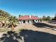 House exterior showcasing a red tile roof at 4255 W State Highway 168, Moapa, NV 89025
