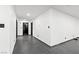 Modern hallway with dark gray tile flooring and white walls at 4255 W State Highway 168, Moapa, NV 89025