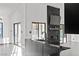 Contemporary kitchen island with black countertops at 4255 W State Highway 168, Moapa, NV 89025