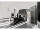 Modern kitchen with dark cabinetry, stainless steel appliances, and an island at 4255 W State Highway 168, Moapa, NV 89025