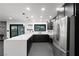 Modern kitchen with white quartz countertops and dark cabinetry at 4255 W State Highway 168, Moapa, NV 89025