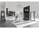 Open living area with high ceilings, fireplace and kitchen at 4255 W State Highway 168, Moapa, NV 89025